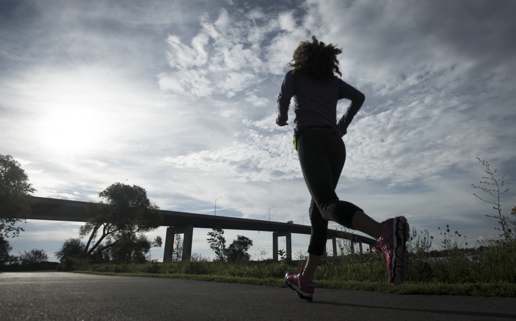 BELLEVILLE, Ont. (15/09/2013) — A woman runs at the Terry Fox Run for Cancer on Sunday, Sept. 15, 2013 at Zwick's Centennial Park, Belleville, Ont. This is the 33rd year which Terry Fox Run is organized across Canada. The run hopes to raise awareness and give support to cancer patients and commemorate those lives which has taken away by cancer. Photo by Justin Chin