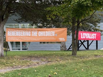 Sign stating Remember the Children. For truth and reconciliation week. 